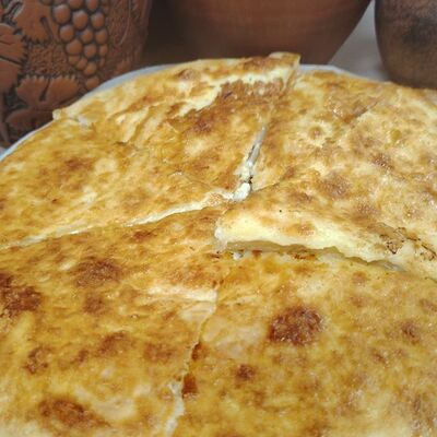 Осетинский пирог с картофелем и сыром в Сандро по цене 840 ₽