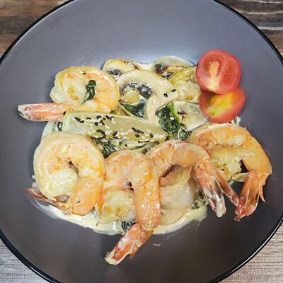 Тигровые креветки в сливочном соусе в Изуми по цене 685 ₽