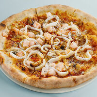 Пицца с морепродуктами по-луизиански в Терраса