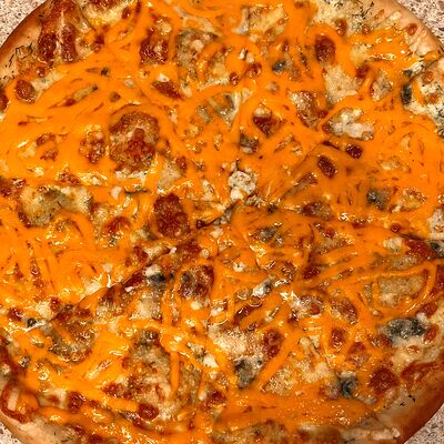 Пицца Четыре сыра в CITY Food по цене 700 ₽
