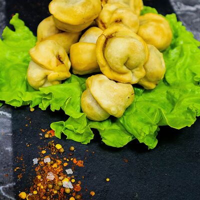 Пельмени жареные в Пончик лайк по цене 349 ₽