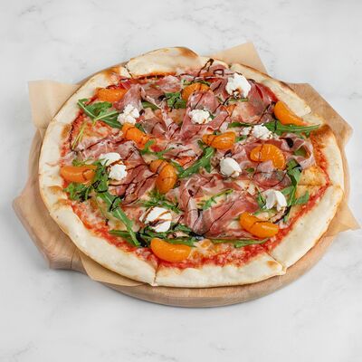 Пицца фирменная в Cafecafe по цене 790 ₽