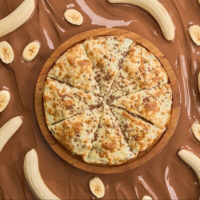 Пицца Сумасшедший банан в Вкусный кофе по цене 1950 ₽