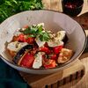 Теплый салат с баклажанами, томатами и творожным сыром в Liman по цене 610