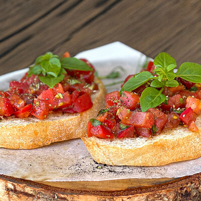 Брускетта с помидорами в Christian по цене 920 ₽