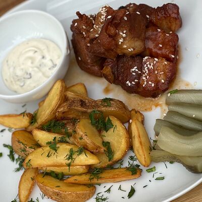 Ребрышки свиные с картофельными дольками в Собрание по цене 810 ₽