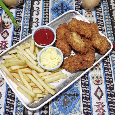 Наггетсы куриные с картофелем фри в Ресторан Барашек по цене 650 ₽