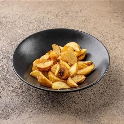 Деревенский картофель с чесноком в У рыбака по цене 290 ₽