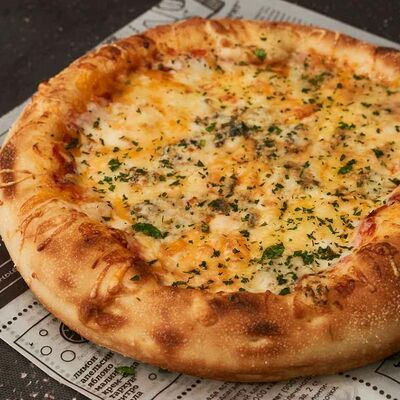 Пицца Четыре сыра L Сушими в Сушими по цене 525 ₽