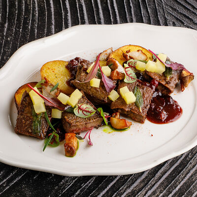 Нежные кусочки печени с белыми грибами в Ginza по цене 1690 ₽