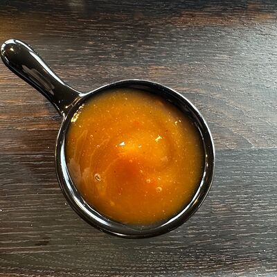 Кисло-сладкий соус в Amigoos по цене 90 ₽