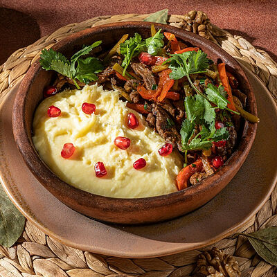 Ташмиджаби с говядиной и овощами в Джонджоли по цене 790 ₽