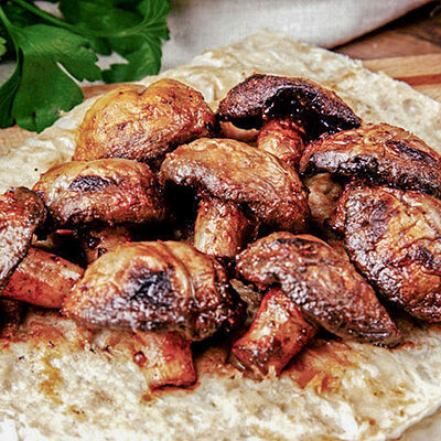 Шампиньоны на углях в Гриль Мания по цене 380 ₽