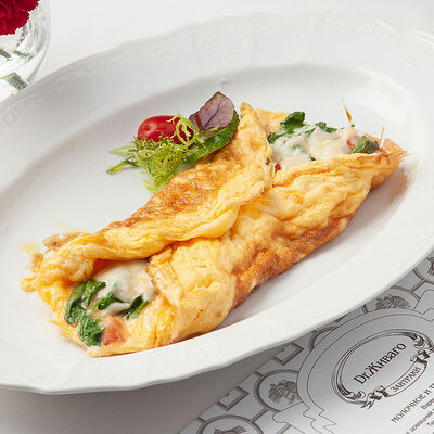 Омлет с томатами, сыром сулугуни и кинзой в Dr. Живаго по цене 550 ₽