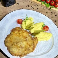 Шницель cвинoй в Ramada