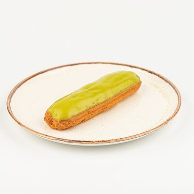 Эклер фисташковый в Kitchen по цене 350 ₽