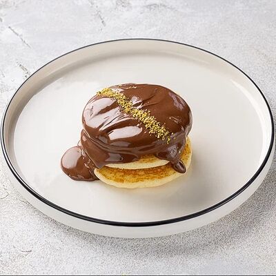 Панкейки с шоколадно-ореховой пастой Нутелла в Шоколадница по цене 485 ₽