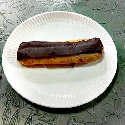 Шоколадный эклер в La Vida loca по цене 250 ₽