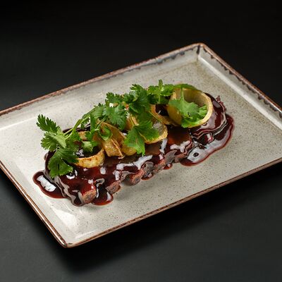 Свиные рёбра в Pinta Haus по цене 730 ₽