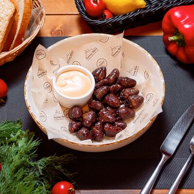 Куриные сердечки к пиву с соусом спайси в Золотая прага по цене 680 ₽