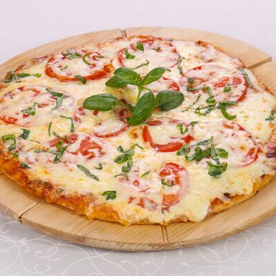 Пицца Маргарита в Мансарда по цене 620 ₽