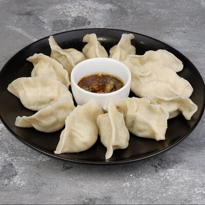 Вареные пельмени со свининой и креветкой в Китайские слухи по цене 610 ₽