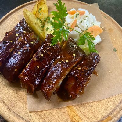 Острые свиные ребрышки в Первая реберная Кухня по цене 650 ₽