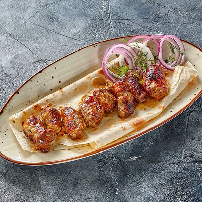 Шашлык из бараньей печени в жировой сетке в Менуа по цене 830 ₽