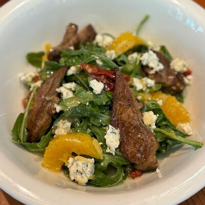 Салат с утиной печенью в Ранчо Grill & Bar по цене 740 ₽