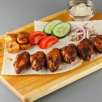 Шашлык из крыльев в Meat & Grill