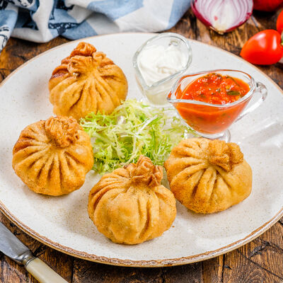 Хинкали по-грузински в Роял Палас по цене 100 ₽