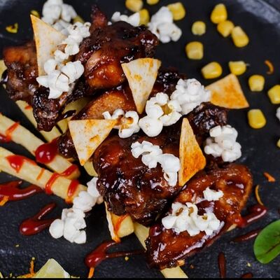 Крылья в соусе кола-барбекюв Dimcoffee по цене 700 ₽