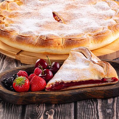 Пирог Ягодное ассортив Осетинские Пироги по цене 1300 ₽