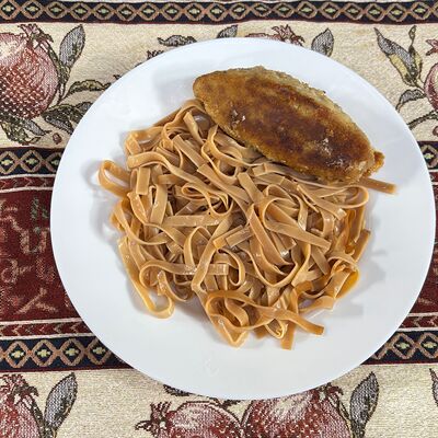 Котлета куриная с лапшой домашней в Каракилис по цене 399 ₽