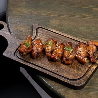 Крылья в соево-медовом соусе в Лаунж бар 6/20 по цене 715 ₽