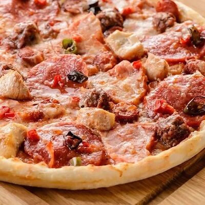 Пицца Мясная в Мускат по цене 837 ₽