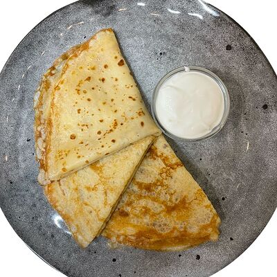 Блинчики со сметаной в The art cafe по цене 195 ₽