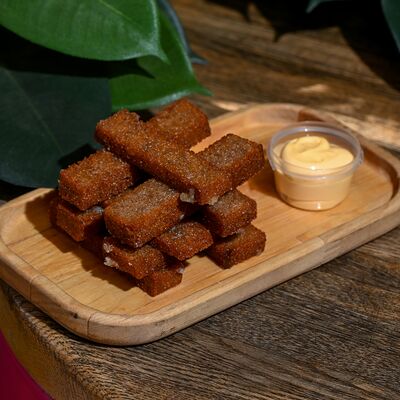 Гренки чесночные в Контейнер по цене 330 ₽