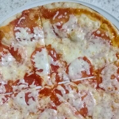 Пицца Маргарита 30см в Oasis по цене 690 ₽