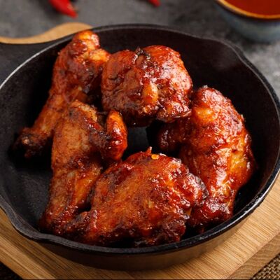 Острые куриные крылья в Охота на Енота по цене 470 ₽
