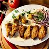 Куриные крылышки на угляхв Кинза по цене 640