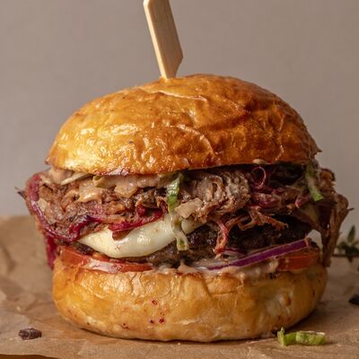 Мясной бургер в Вкус дружбы по цене 1070 ₽