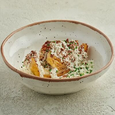 Печёная капуста с трюфельным соусом и бородинским крамблом в Buana cafe по цене 870 ₽