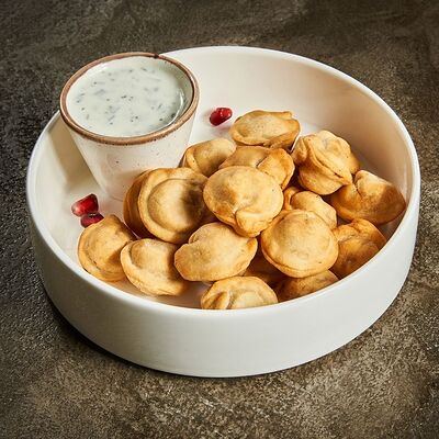 Чучвара жареная с говядиной с мацони в Гранат по цене 490 ₽