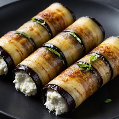 Рулетики из баклажан с сыром и чесноком в Бизон по цене 1000 ₽