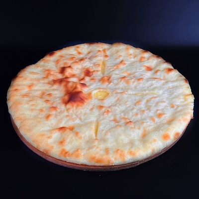 Осетинский пирог с сыром и картошкойв Чебуречная по цене 924 ₽