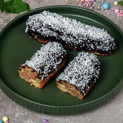 Эклер с шоколадом в CHO-KAVO по цене 140 ₽