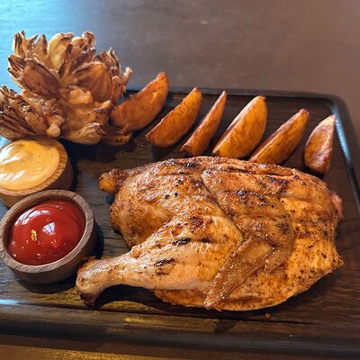 Цыпленок табака на мангале в Дикий койот по цене 950 ₽