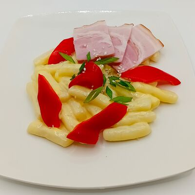 Токпокки в сырном соусе в NSeoul Корейская кухня по цене 549 ₽