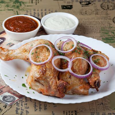 Голень куриная на мангале в Мангал & Бар по цене 365 ₽